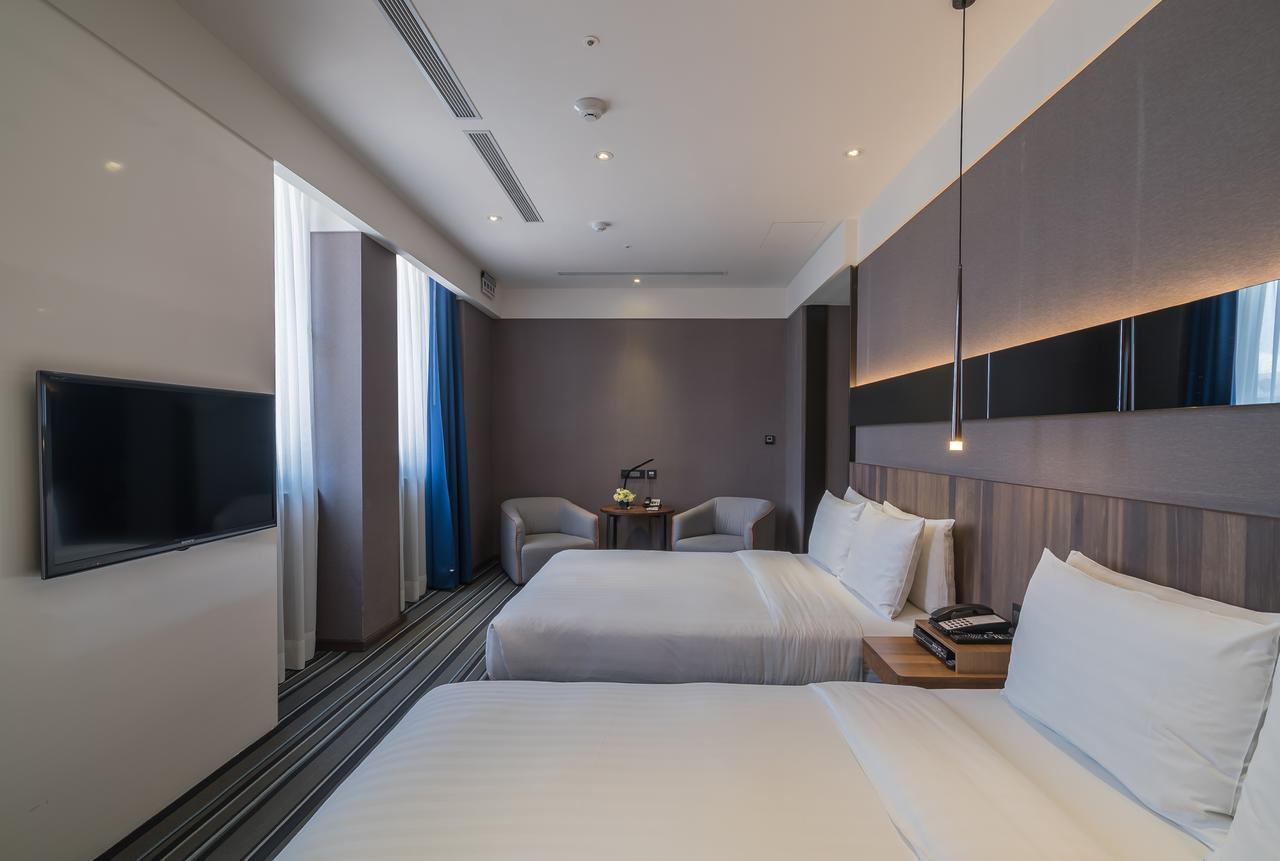 Premier Quadruple Room with 2 Queen Beds